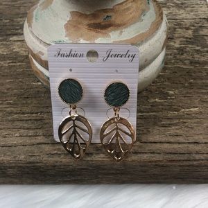 New fashion earrings. Green studs with a gold leaf